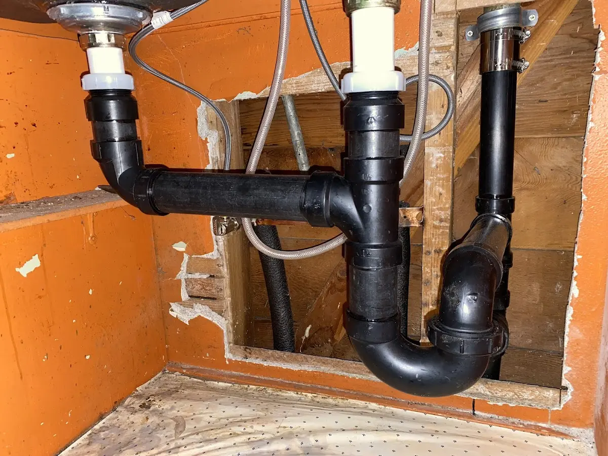 Professional Garbage Disposal Repair equipment and tools on the job in Parma Heights